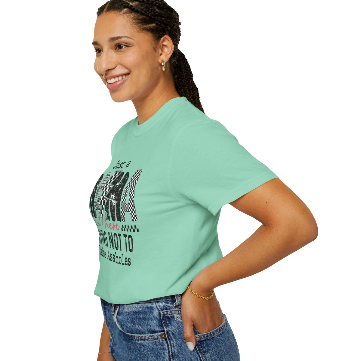 Just a Mama Out Here Trying Not To Raise Assholes - Comfort Colors | Trendy Women's T-Shirt. Direct to Garment. Printed & Shipped in the USA. Unisex Sizes.