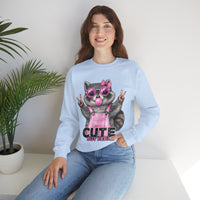 Cute But Feral, Raccoon in Pink Bibs – Gildan Heavy Blend | Trendy Women’s Soft Sweatshirt. Direct to Garment. Printed & Shipped in the USA. Unisex Sizes.