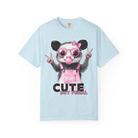 Cute But Feral, Possum in Pink Bibs - Comfort Colors | Trendy Women's T-Shirt. Direct to Garment. Printed & Shipped in the USA. Unisex Sizes.