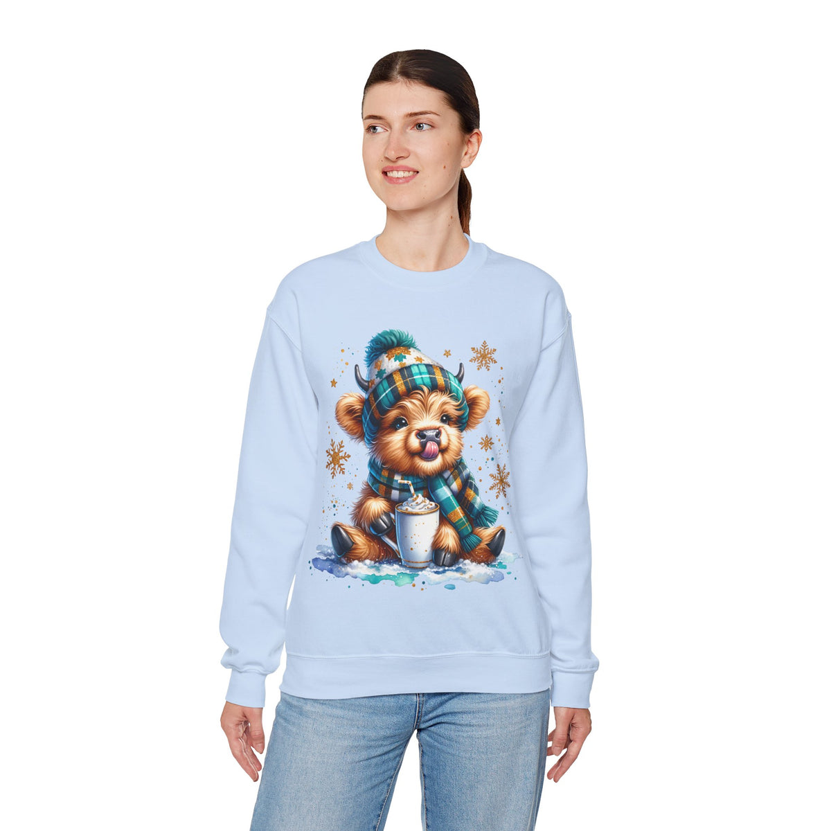 Winter Baby Highland Cow with Cocoa – Gildan Heavy Blend | Trendy Women’s Soft Sweatshirt. Direct to Garment. Printed & Shipped in the USA. Unisex Sizes.