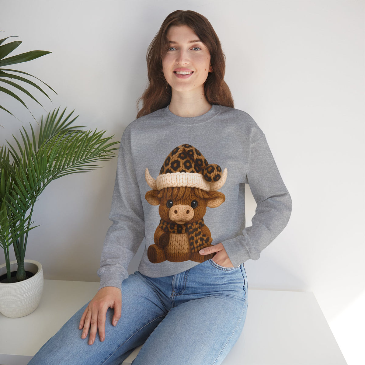 Cute Highland Cow with Leopard Santa Hat Christmas – Gildan Heavy Blend | Trendy Women’s Soft Sweatshirt. Direct to Garment. Printed & Shipped in the USA. Unisex Sizes.