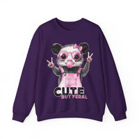 Cute But Feral, Possum in Pink Bibs – Gildan Heavy Blend | Trendy Women’s Soft Sweatshirt. Direct to Garment. Printed & Shipped in the USA. Unisex Sizes.