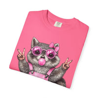 Cute But Feral, Raccoon in Pink Bibs - Comfort Colors | Trendy Women's T-Shirt. Direct to Garment. Printed & Shipped in the USA. Unisex Sizes.