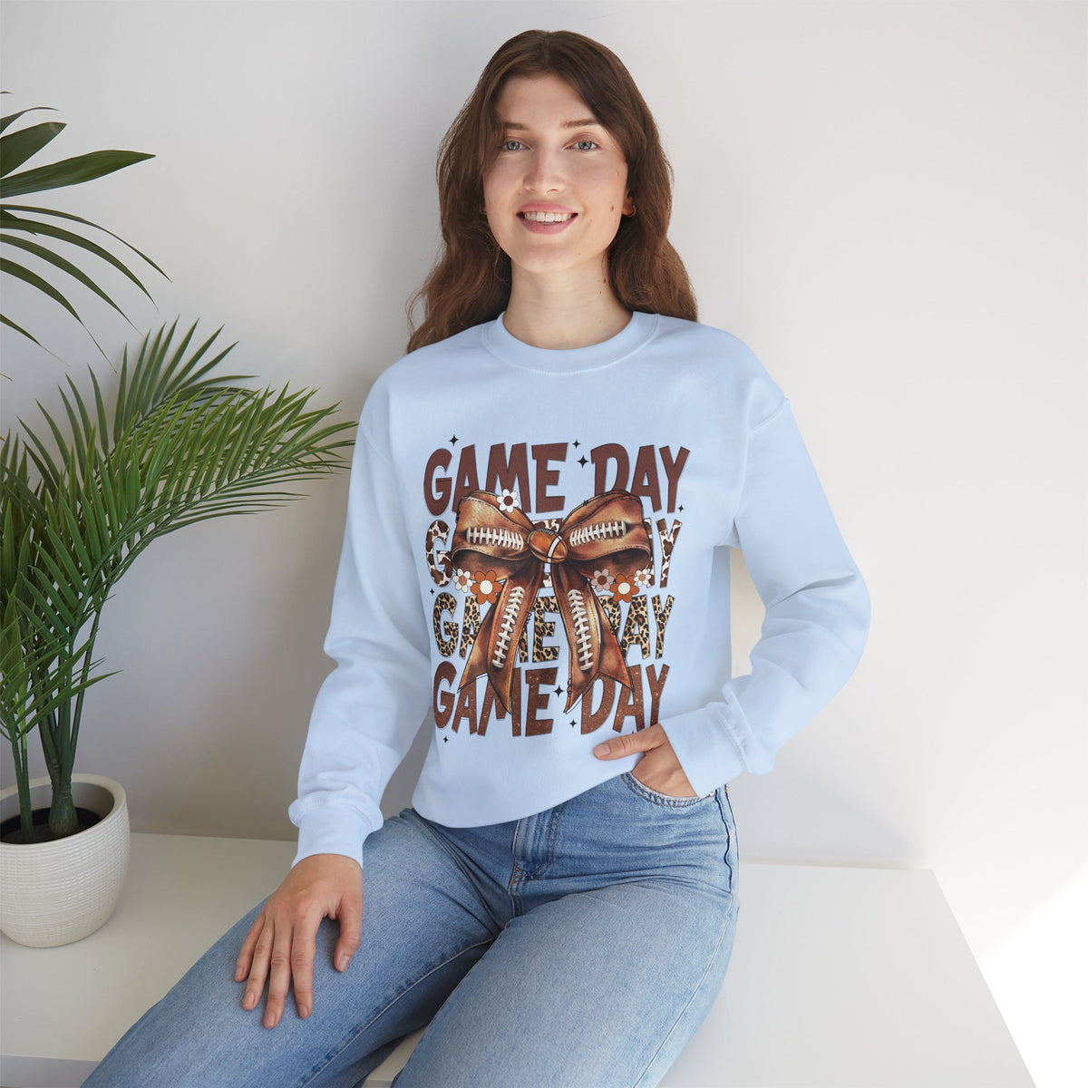 Game Day - Football Bow – Gildan Heavy Blend | Trendy Women’s Soft Sweatshirt. Direct to Garment. Printed & Shipped in the USA. Unisex Sizes.
