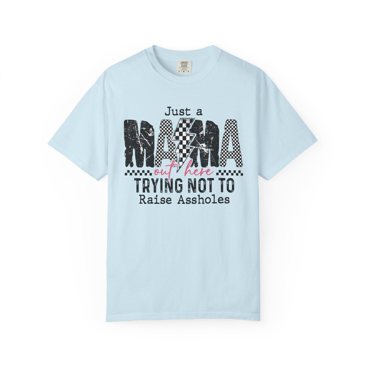 Just a Mama Out Here Trying Not To Raise Assholes - Comfort Colors | Trendy Women's T-Shirt. Direct to Garment. Printed & Shipped in the USA. Unisex Sizes.
