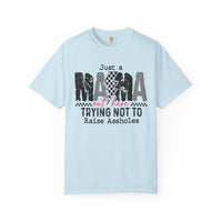 Just a Mama Out Here Trying Not To Raise Assholes - Comfort Colors | Trendy Women's T-Shirt. Direct to Garment. Printed & Shipped in the USA. Unisex Sizes.