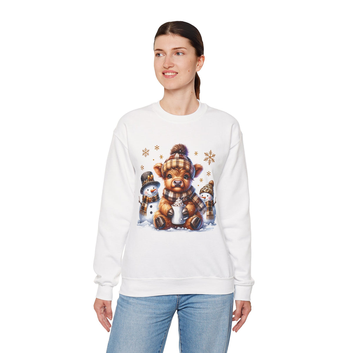 Cute Highland Cow with Snowmen, Winter – Gildan Heavy Blend | Trendy Women’s Soft Sweatshirt. Direct to Garment. Printed & Shipped in the USA. Unisex Sizes.