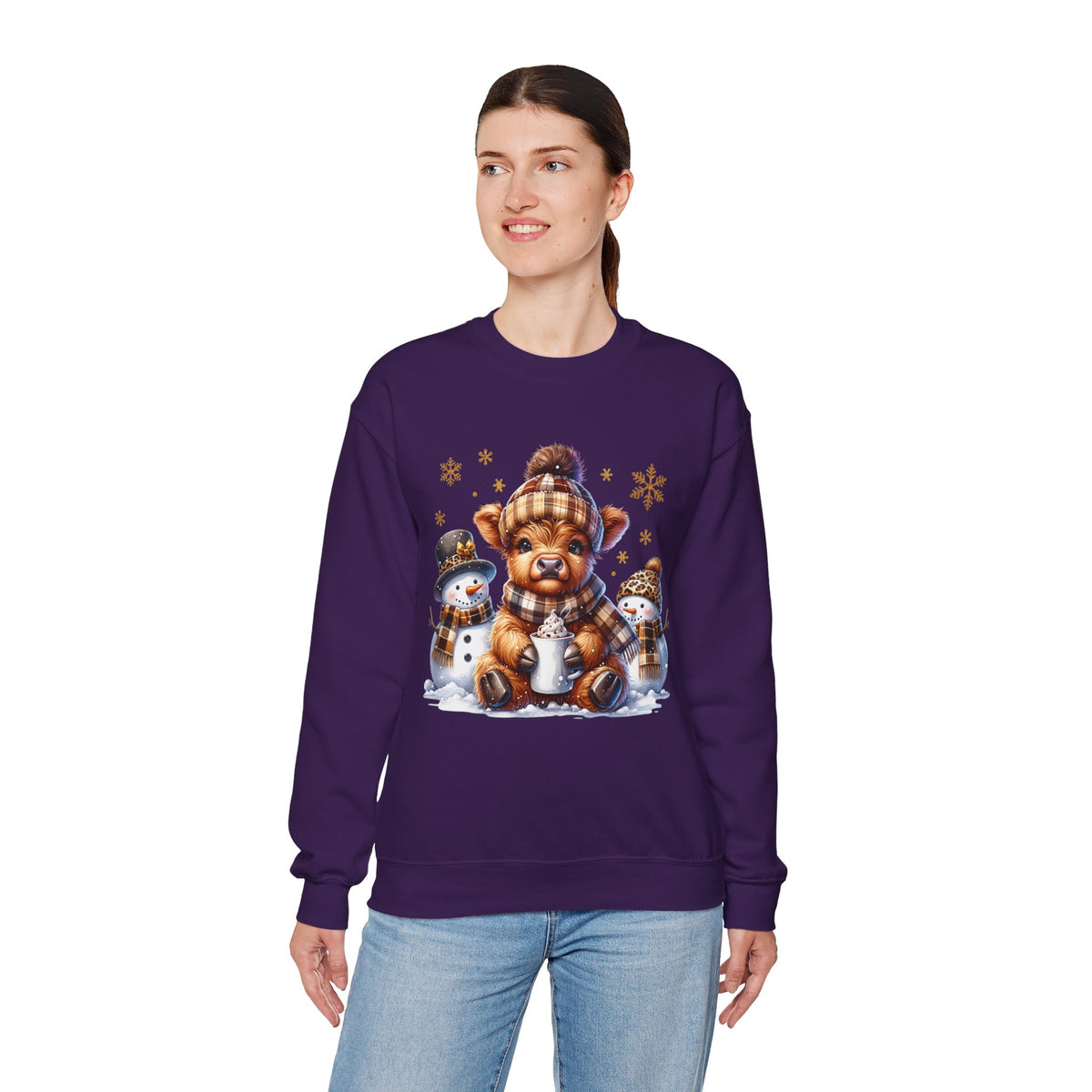 Cute Highland Cow with Snowmen, Winter – Gildan Heavy Blend | Trendy Women’s Soft Sweatshirt. Direct to Garment. Printed & Shipped in the USA. Unisex Sizes.