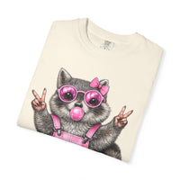 Cute But Feral, Raccoon in Pink Bibs - Comfort Colors | Trendy Women's T-Shirt. Direct to Garment. Printed & Shipped in the USA. Unisex Sizes.