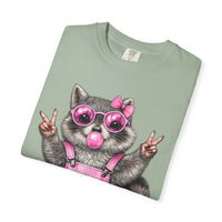 Cute But Feral, Raccoon in Pink Bibs - Comfort Colors | Trendy Women's T-Shirt. Direct to Garment. Printed & Shipped in the USA. Unisex Sizes.