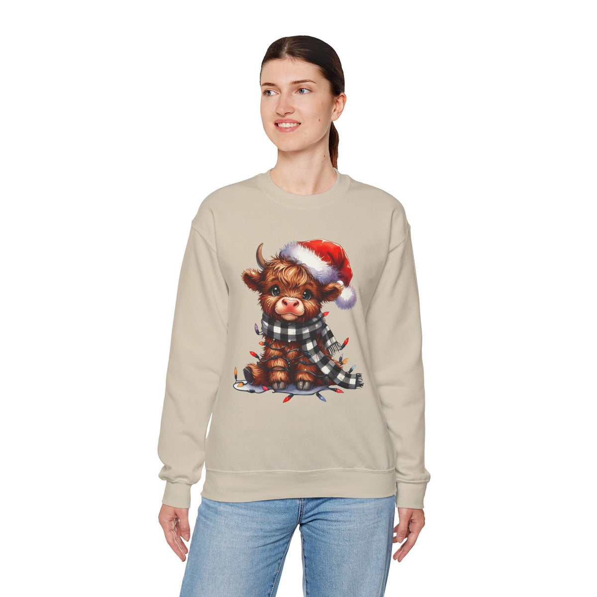Cute Highland Cow Santa Hat Scarf Christmas Lights – Gildan Heavy Blend | Trendy Women’s Soft Sweatshirt. Direct to Garment. Printed & Shipped in the USA. Unisex Sizes.