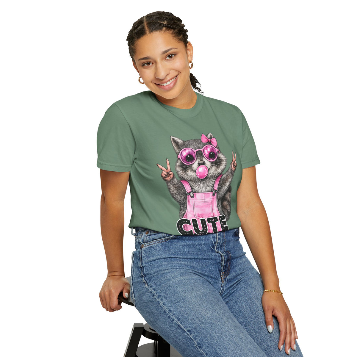 Cute But Feral, Raccoon in Pink Bibs - Comfort Colors | Trendy Women's T-Shirt. Direct to Garment. Printed & Shipped in the USA. Unisex Sizes.