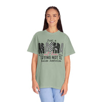 Just a Mama Out Here Trying Not To Raise Assholes - Comfort Colors | Trendy Women's T-Shirt. Direct to Garment. Printed & Shipped in the USA. Unisex Sizes.