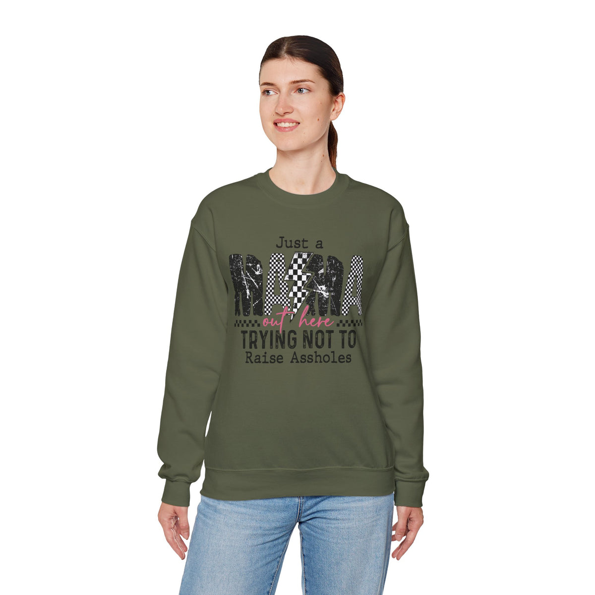 Just a Mama Out Here Trying Not To Raise Assholes – Gildan Heavy Blend | Trendy Women’s Soft Sweatshirt. Direct to Garment. Printed & Shipped in the USA. Unisex Sizes.