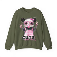 Cute But Feral, Possum in Pink Bibs – Gildan Heavy Blend | Trendy Women’s Soft Sweatshirt. Direct to Garment. Printed & Shipped in the USA. Unisex Sizes.