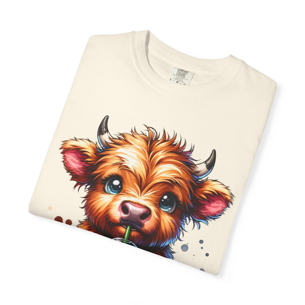 Coffee Addict Highland Cow Drinking Iced Coffee - Comfort Colors | Trendy Women's T-Shirt. Direct to Garment. Printed & Shipped in the USA. Unisex Sizes.