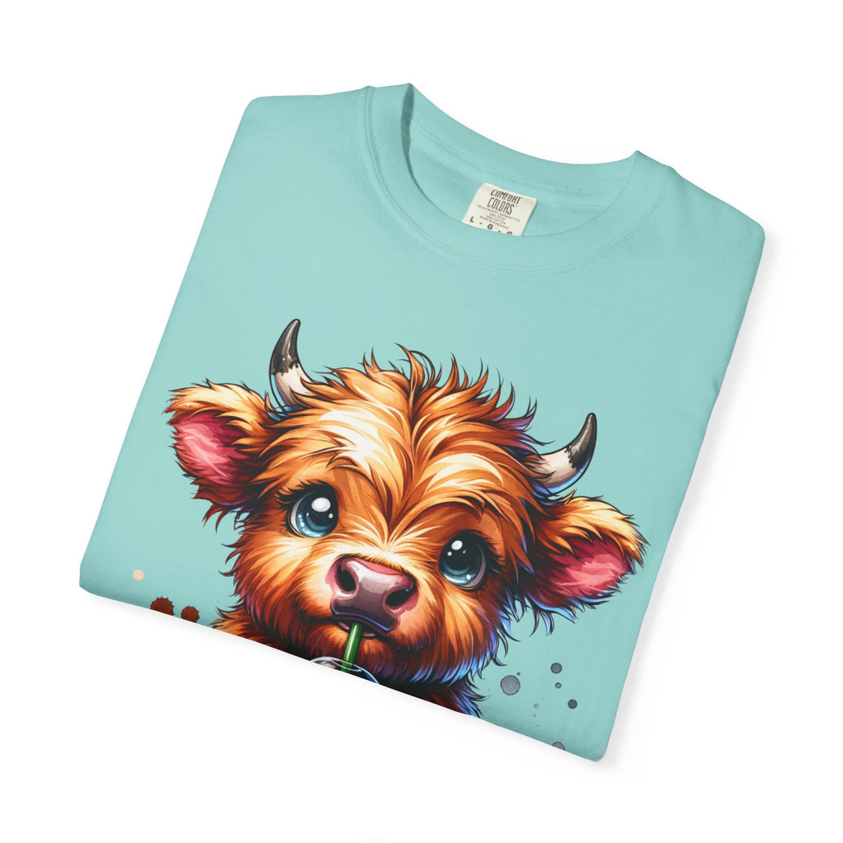 Coffee Addict Highland Cow Drinking Iced Coffee - Comfort Colors | Trendy Women's T-Shirt. Direct to Garment. Printed & Shipped in the USA. Unisex Sizes.