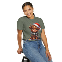 Cute Highland Cow Santa Hat Scarf Christmas Lights - Comfort Colors | Trendy Unisex T-Shirt. Direct to Garment. Printed & Shipped in the USA. Unisex Sizes.