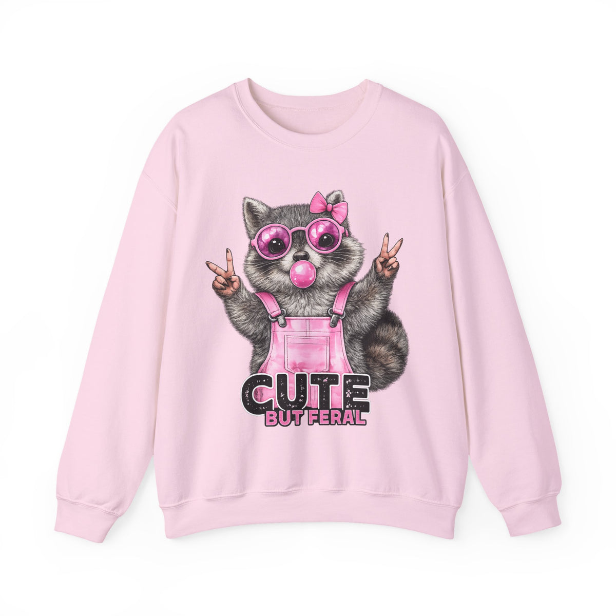 Cute But Feral, Raccoon in Pink Bibs – Gildan Heavy Blend | Trendy Women’s Soft Sweatshirt. Direct to Garment. Printed & Shipped in the USA. Unisex Sizes.