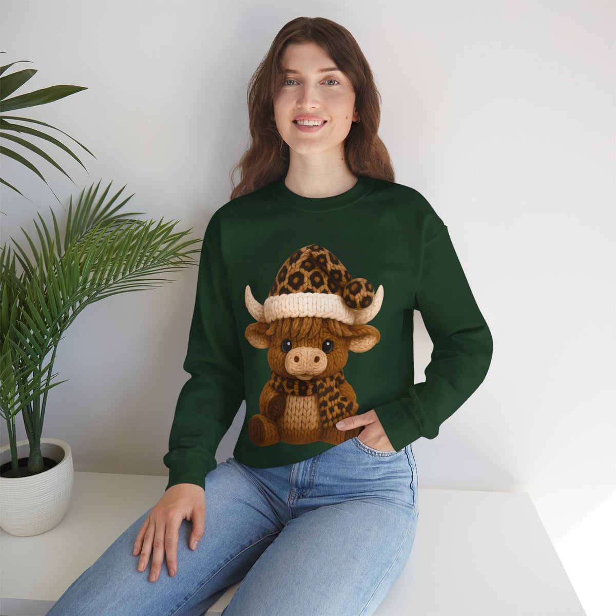 Cute Highland Cow with Leopard Santa Hat Christmas – Gildan Heavy Blend | Trendy Women’s Soft Sweatshirt. Direct to Garment. Printed & Shipped in the USA. Unisex Sizes.