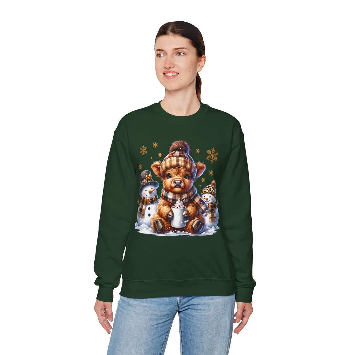 Cute Highland Cow with Snowmen, Winter – Gildan Heavy Blend | Trendy Women’s Soft Sweatshirt. Direct to Garment. Printed & Shipped in the USA. Unisex Sizes.
