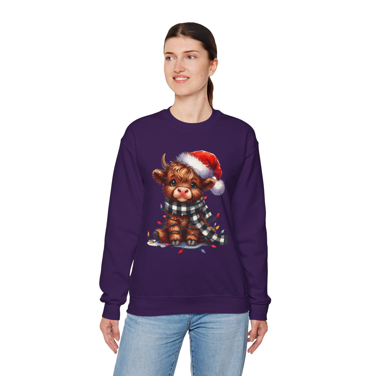 Cute Highland Cow Santa Hat Scarf Christmas Lights – Gildan Heavy Blend | Trendy Women’s Soft Sweatshirt. Direct to Garment. Printed & Shipped in the USA. Unisex Sizes.