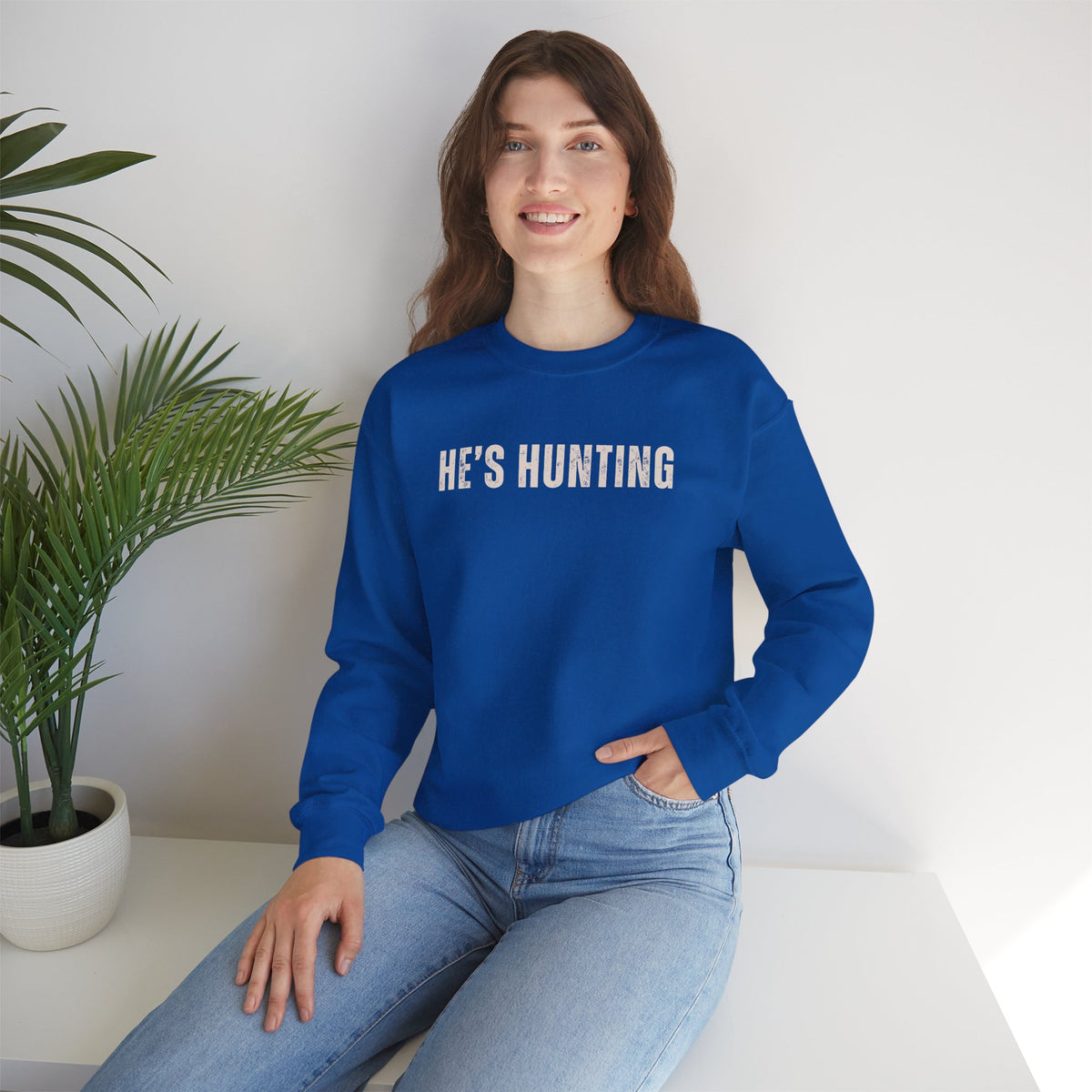 He's Hunting - Distressed – Gildan Heavy Blend | Trendy Women’s Soft Sweatshirt. Direct to Garment. Printed & Shipped in the USA. Unisex Sizes.