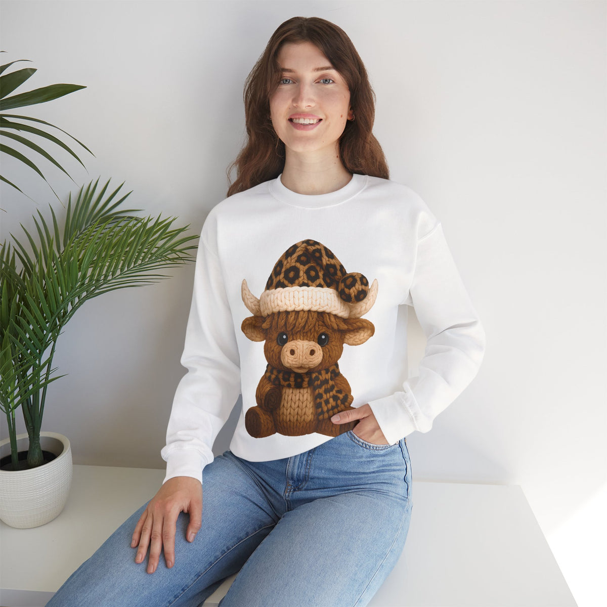 Cute Highland Cow with Leopard Santa Hat Christmas – Gildan Heavy Blend | Trendy Women’s Soft Sweatshirt. Direct to Garment. Printed & Shipped in the USA. Unisex Sizes.