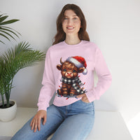 Cute Highland Cow Santa Hat Scarf Christmas Lights – Gildan Heavy Blend | Trendy Women’s Soft Sweatshirt. Direct to Garment. Printed & Shipped in the USA. Unisex Sizes.