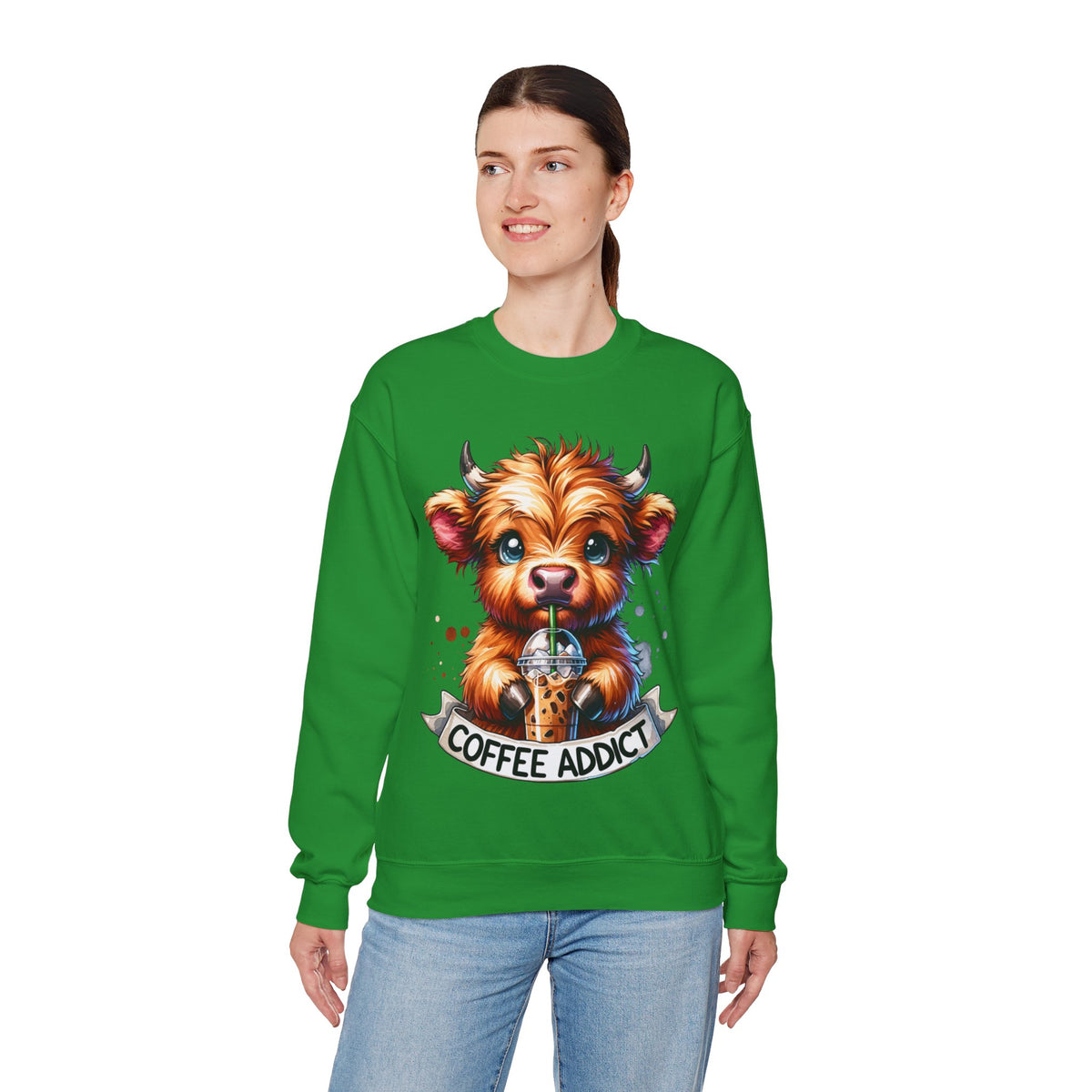 Coffee Addict Highland Cow Drinking Iced Coffee – Gildan Heavy Blend | Trendy Women’s Soft Sweatshirt. Direct to Garment. Printed & Shipped in the USA. Unisex Sizes.