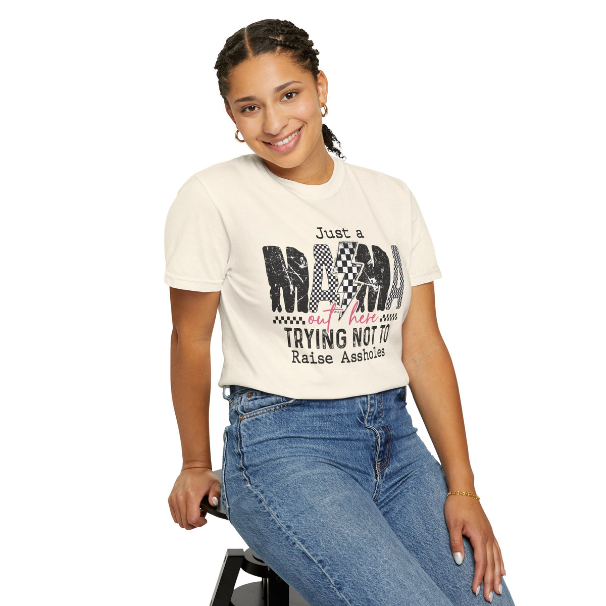 Just a Mama Out Here Trying Not To Raise Assholes - Comfort Colors | Trendy Women's T-Shirt. Direct to Garment. Printed & Shipped in the USA. Unisex Sizes.