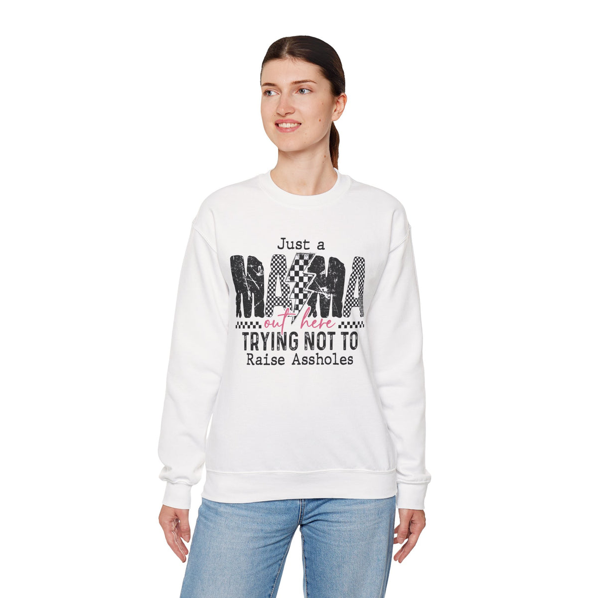 Just a Mama Out Here Trying Not To Raise Assholes – Gildan Heavy Blend | Trendy Women’s Soft Sweatshirt. Direct to Garment. Printed & Shipped in the USA. Unisex Sizes.
