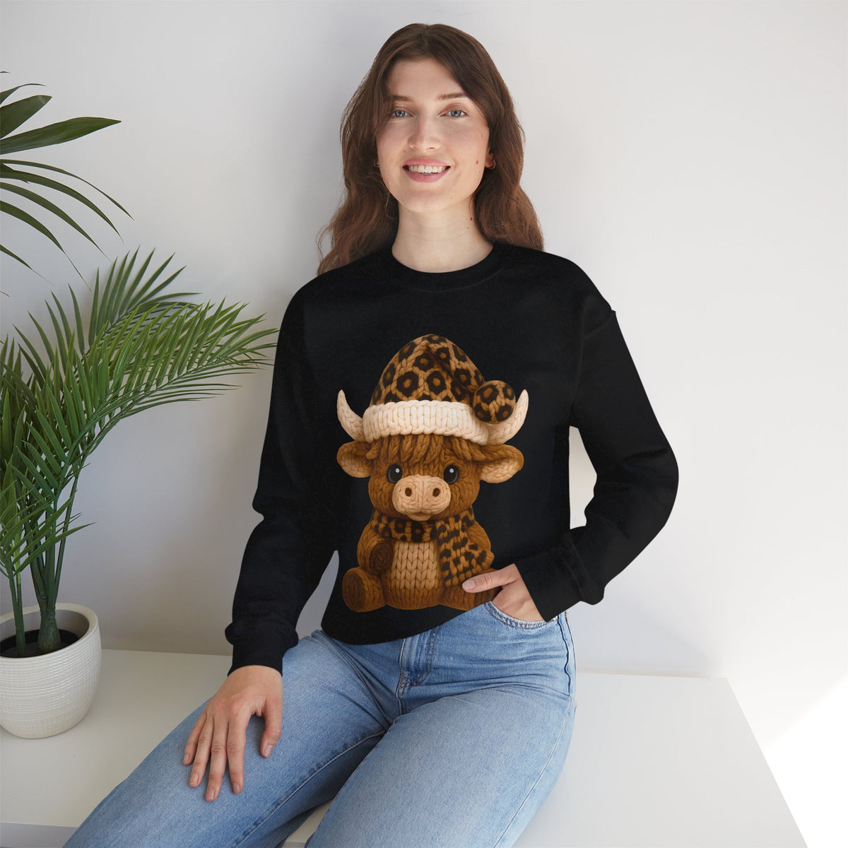 Cute Highland Cow with Leopard Santa Hat Christmas – Gildan Heavy Blend | Trendy Women’s Soft Sweatshirt. Direct to Garment. Printed & Shipped in the USA. Unisex Sizes.