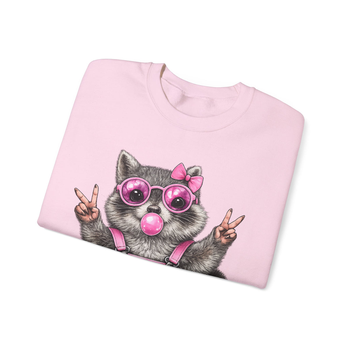 Cute But Feral, Raccoon in Pink Bibs – Gildan Heavy Blend | Trendy Women’s Soft Sweatshirt. Direct to Garment. Printed & Shipped in the USA. Unisex Sizes.