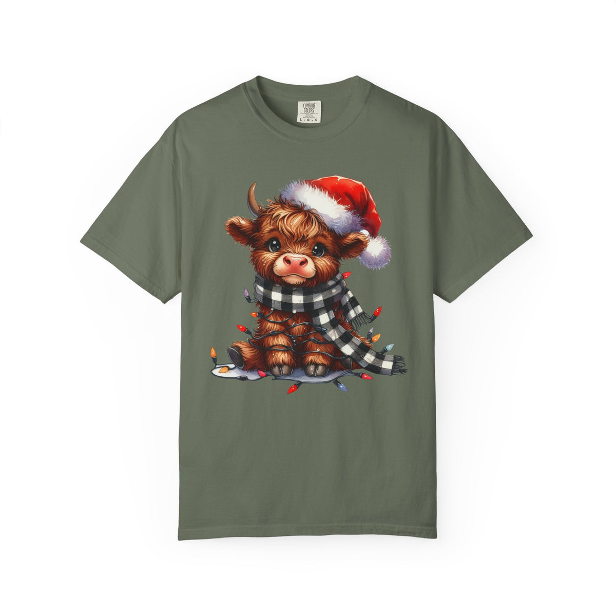 Cute Highland Cow Santa Hat Scarf Christmas Lights - Comfort Colors | Trendy Unisex T-Shirt. Direct to Garment. Printed & Shipped in the USA. Unisex Sizes.
