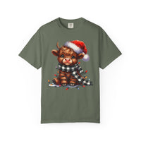 Cute Highland Cow Santa Hat Scarf Christmas Lights - Comfort Colors | Trendy Unisex T-Shirt. Direct to Garment. Printed & Shipped in the USA. Unisex Sizes.