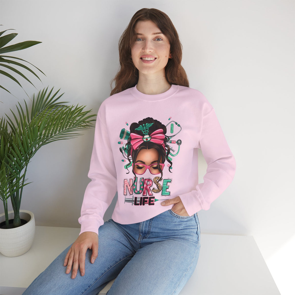 Nurse Life Messy Bun, Cute Stethescope & Syringe – Gildan Heavy Blend | Trendy Women’s Soft Sweatshirt. Direct to Garment. Printed & Shipped in the USA. Unisex Sizes.