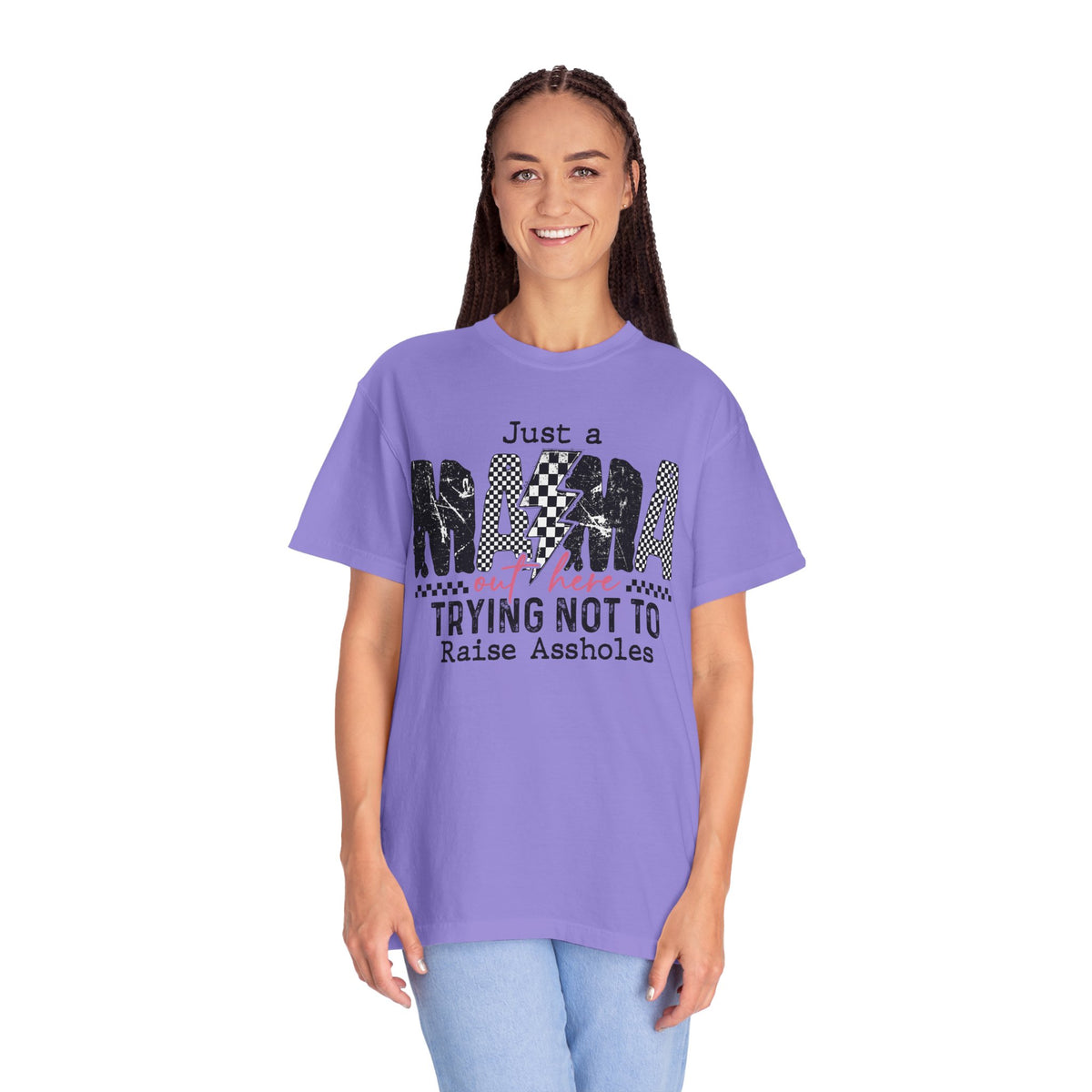Just a Mama Out Here Trying Not To Raise Assholes - Comfort Colors | Trendy Women's T-Shirt. Direct to Garment. Printed & Shipped in the USA. Unisex Sizes.