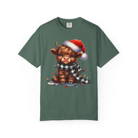 Cute Highland Cow Santa Hat Scarf Christmas Lights - Comfort Colors | Trendy Unisex T-Shirt. Direct to Garment. Printed & Shipped in the USA. Unisex Sizes.