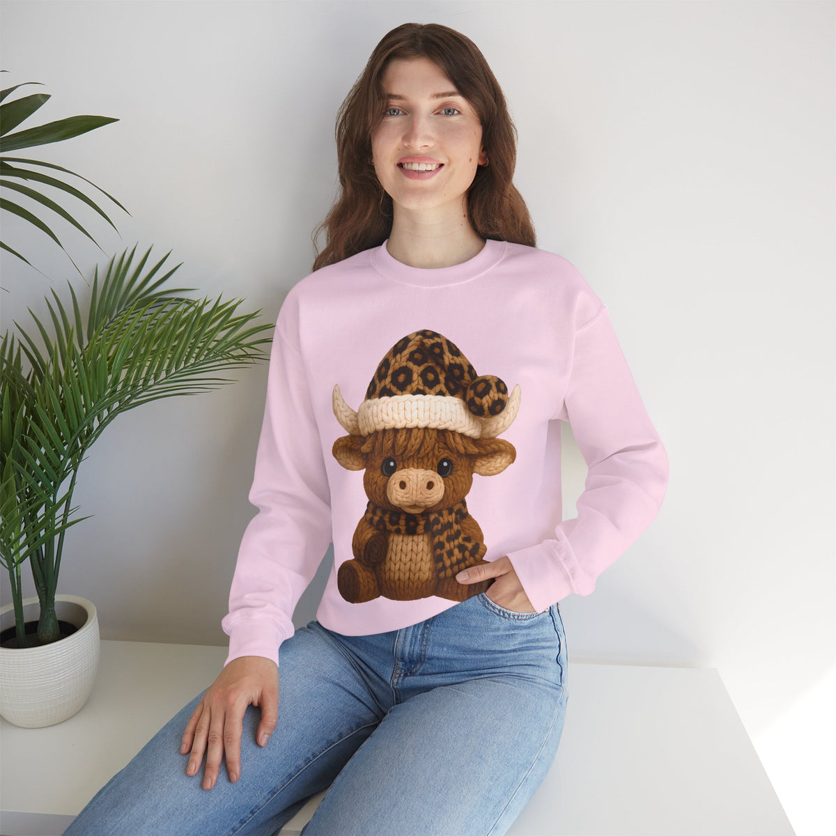 Cute Highland Cow with Leopard Santa Hat Christmas – Gildan Heavy Blend | Trendy Women’s Soft Sweatshirt. Direct to Garment. Printed & Shipped in the USA. Unisex Sizes.