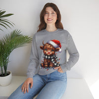 Cute Highland Cow Santa Hat Scarf Christmas Lights – Gildan Heavy Blend | Trendy Women’s Soft Sweatshirt. Direct to Garment. Printed & Shipped in the USA. Unisex Sizes.