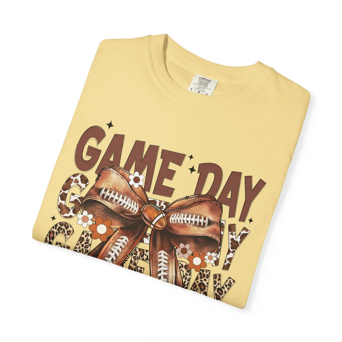 Game Day - Football Bow - Comfort Colors | Trendy Women's T-Shirt. Direct to Garment. Printed & Shipped in the USA. Unisex Sizes.