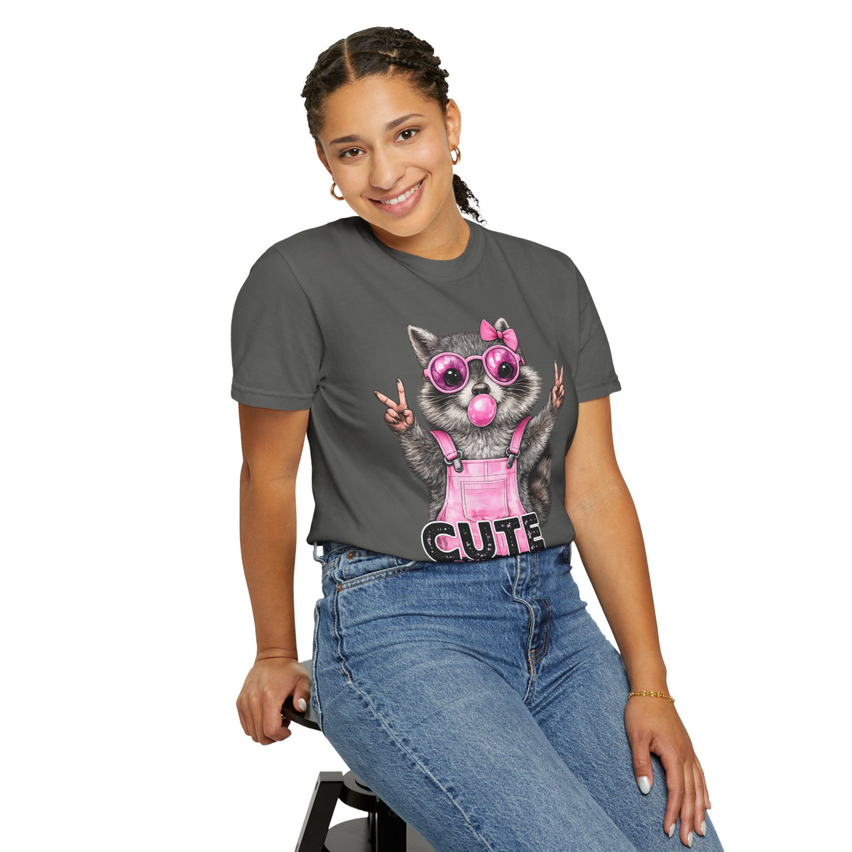 Cute But Feral, Raccoon in Pink Bibs - Comfort Colors | Trendy Women's T-Shirt. Direct to Garment. Printed & Shipped in the USA. Unisex Sizes.