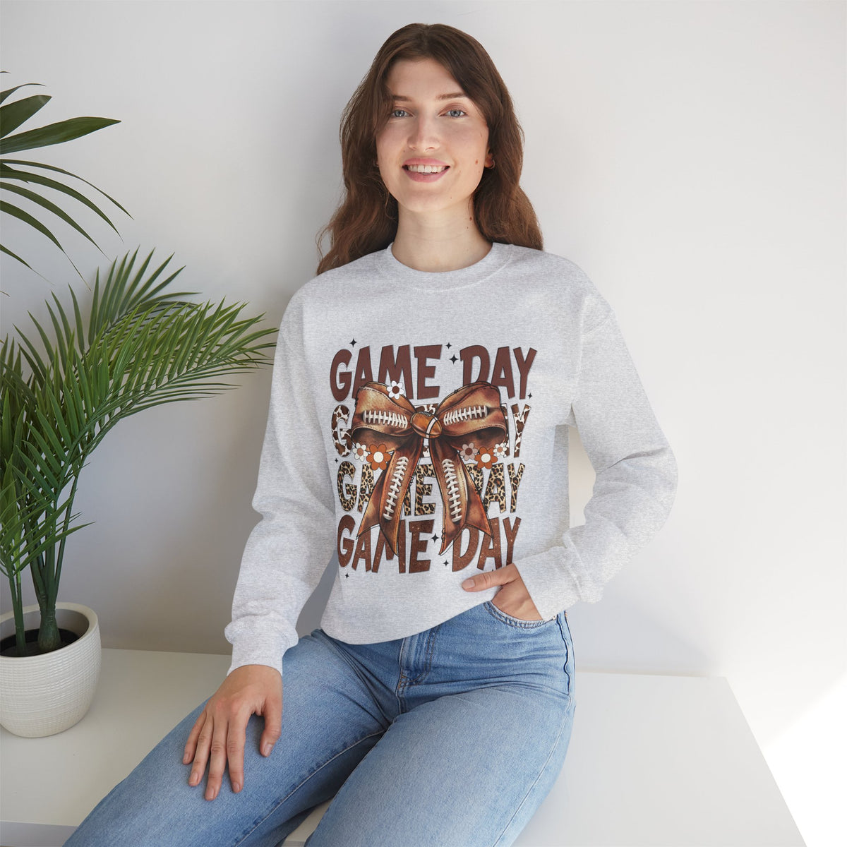 Game Day - Football Bow – Gildan Heavy Blend | Trendy Women’s Soft Sweatshirt. Direct to Garment. Printed & Shipped in the USA. Unisex Sizes.