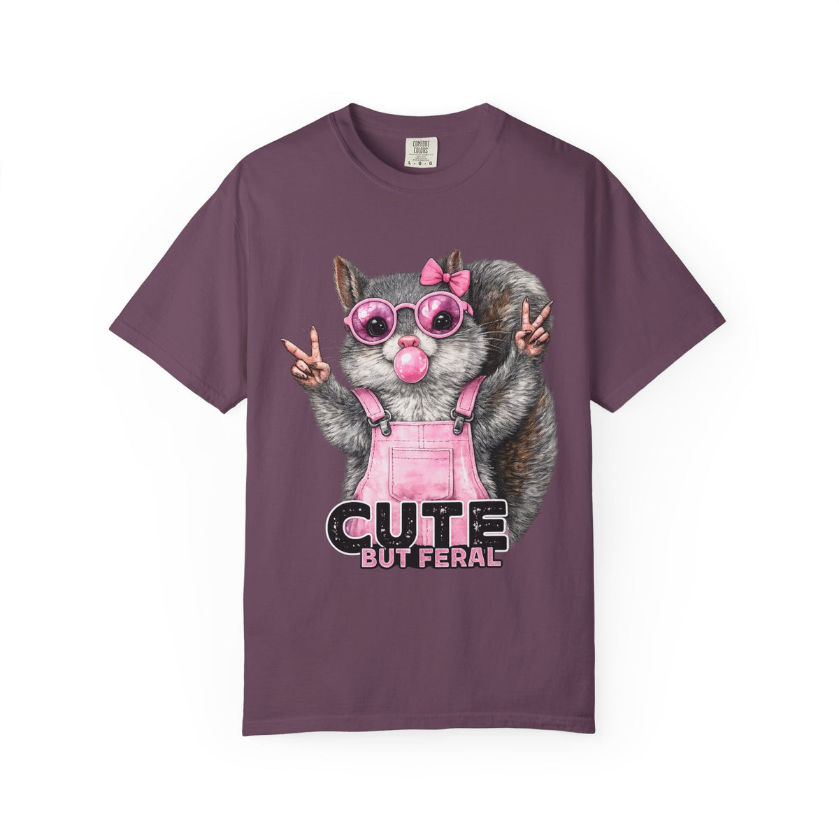 Cute But Feral, Squirrel in Pink Bibs - Comfort Colors | Trendy Women's T-Shirt. Direct to Garment. Printed & Shipped in the USA. Unisex Sizes.