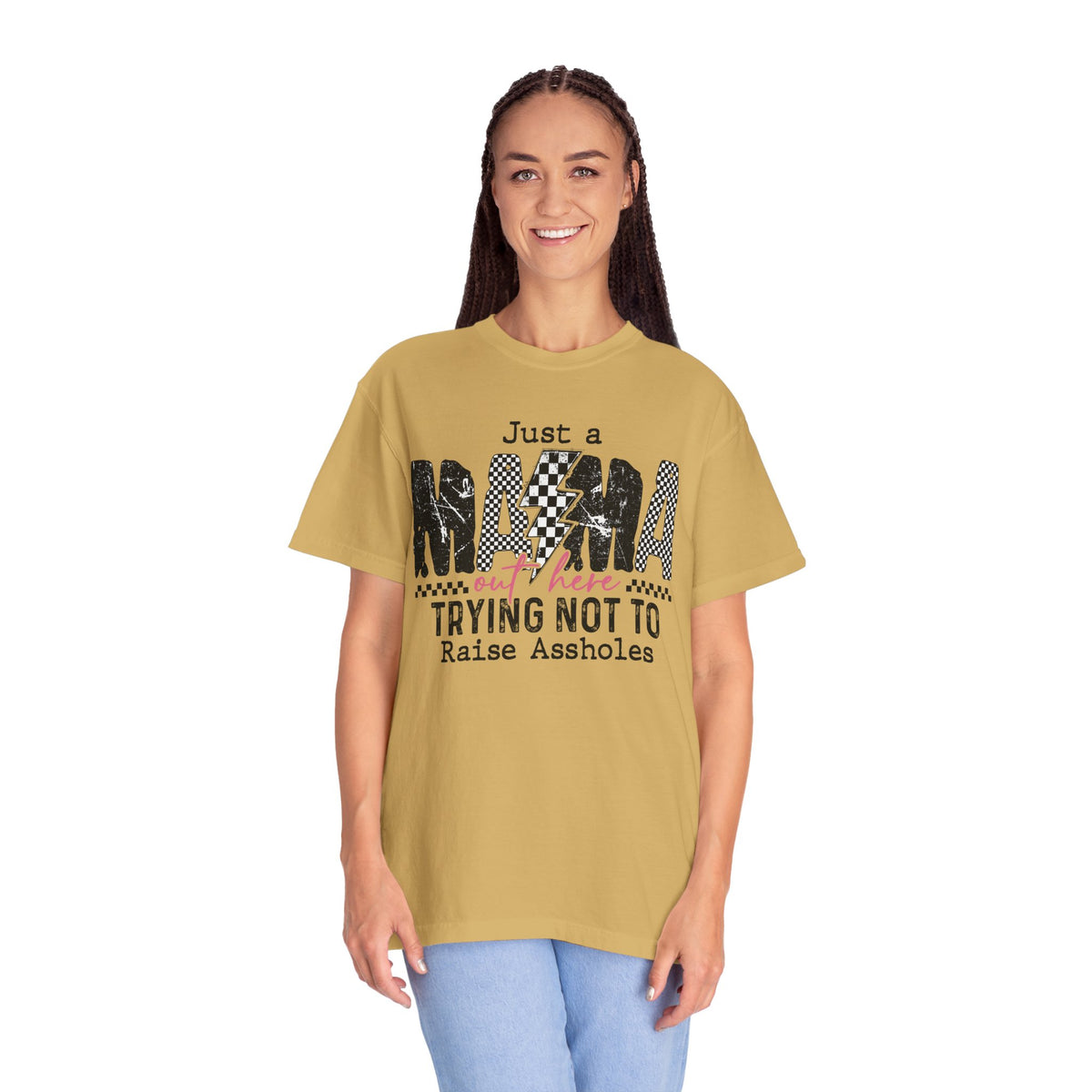 Just a Mama Out Here Trying Not To Raise Assholes - Comfort Colors | Trendy Women's T-Shirt. Direct to Garment. Printed & Shipped in the USA. Unisex Sizes.