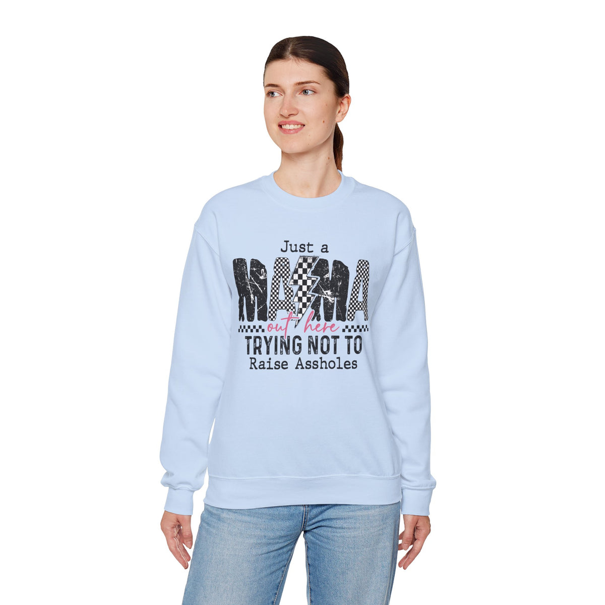 Just a Mama Out Here Trying Not To Raise Assholes – Gildan Heavy Blend | Trendy Women’s Soft Sweatshirt. Direct to Garment. Printed & Shipped in the USA. Unisex Sizes.