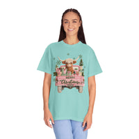 Highland Cow in Pink Truck Merry Christmas Holiday Farmhouse - Comfort Colors | Trendy Women's T-Shirt. Direct to Garment. Printed & Shipped in the USA. Unisex Sizes.