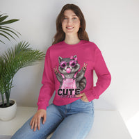 Cute But Feral, Raccoon in Pink Bibs – Gildan Heavy Blend | Trendy Women’s Soft Sweatshirt. Direct to Garment. Printed & Shipped in the USA. Unisex Sizes.