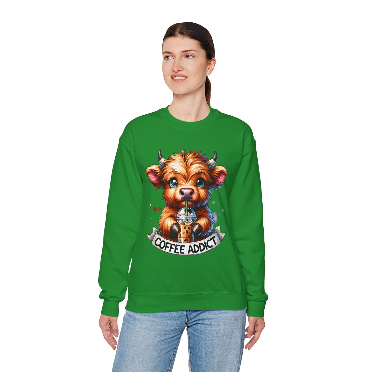 Coffee Addict Highland Cow Drinking Iced Coffee – Gildan Heavy Blend | Trendy Women’s Soft Sweatshirt. Direct to Garment. Printed & Shipped in the USA. Unisex Sizes.